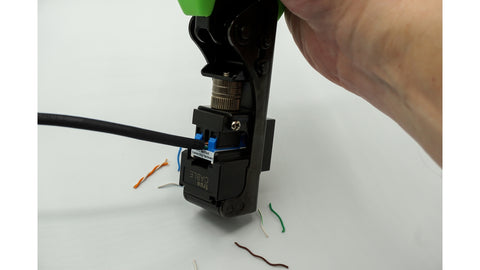 The EZ termination tool makes this simple. Place the pre-threaded jack in the tool, and operate the handle. All conductors should be seated and cut in one operation.