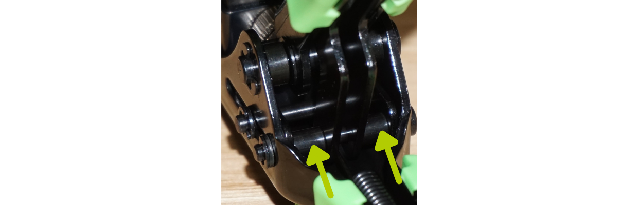 Three small drops of oil at the indicated points