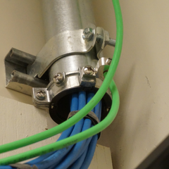 Installed example of a split collar, bonded to the conduit and back to the SBB