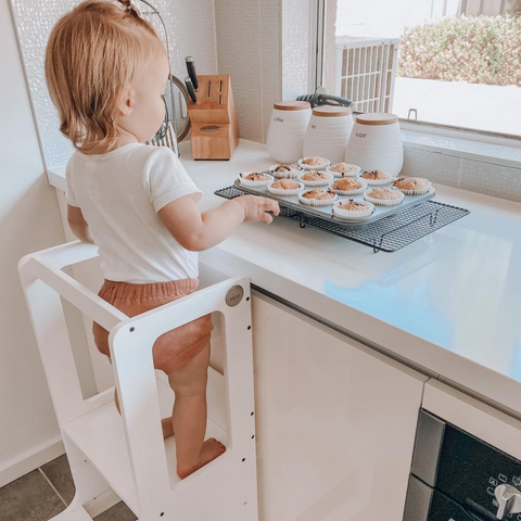 Toddler helping to bake