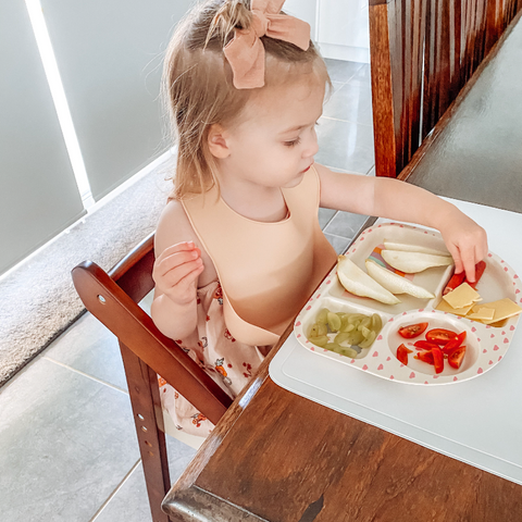 Toddler eating Veggies