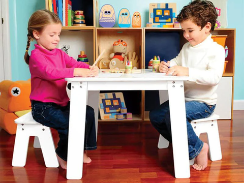 child playing at table