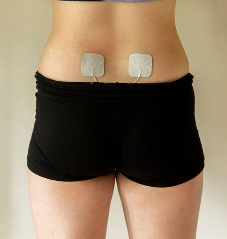 Electrode Pad Position for Lower Back Menstrual Cramp Pain