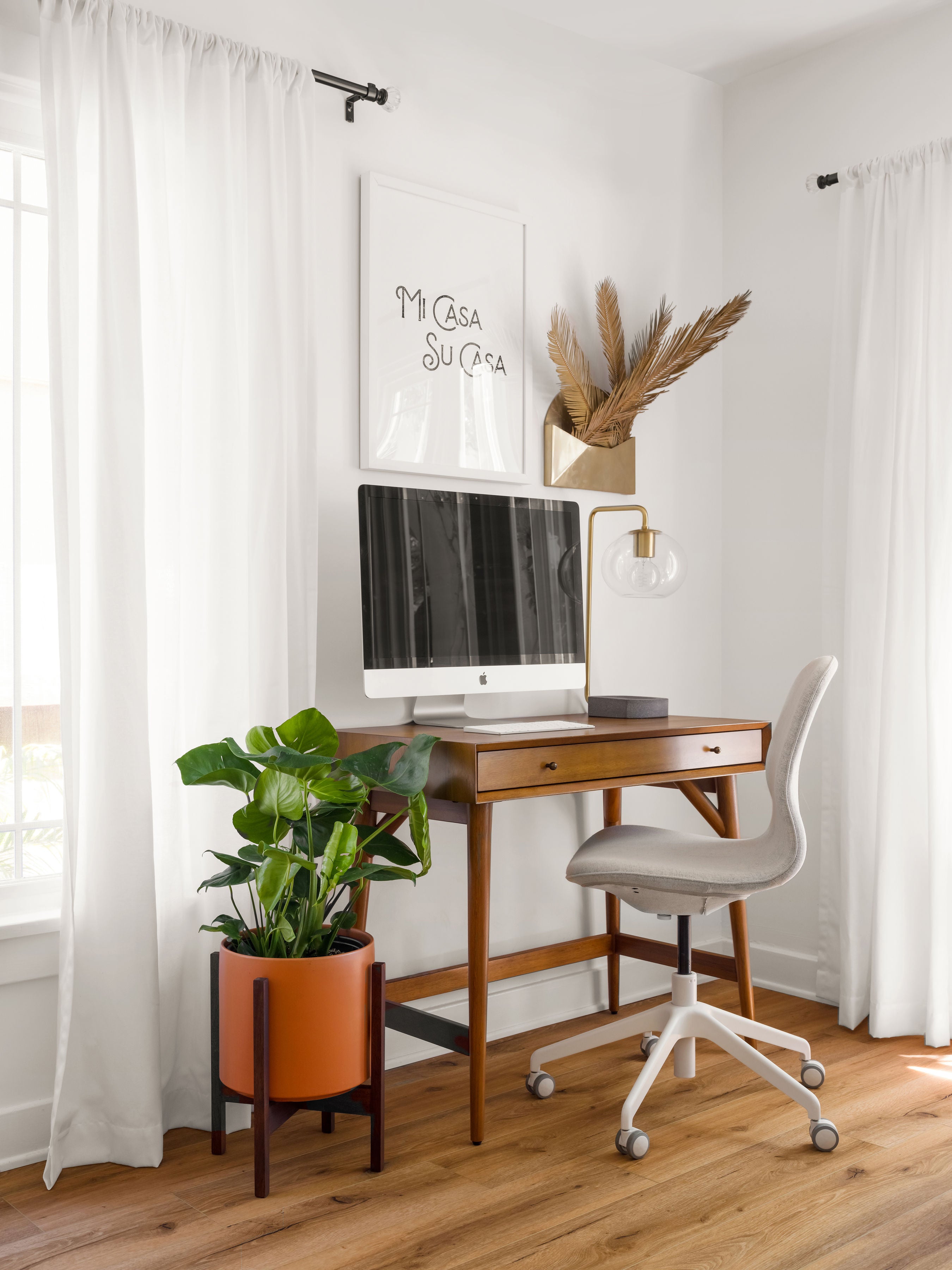 Image of Home Office with MidCentury Modern Ceramic Cylinder Planter next to Desk with Computer Monitor