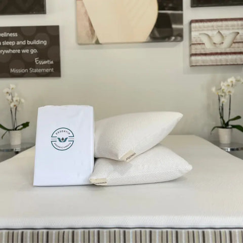 Essentia pillows and Body Guard mattress protector shown on a mattress