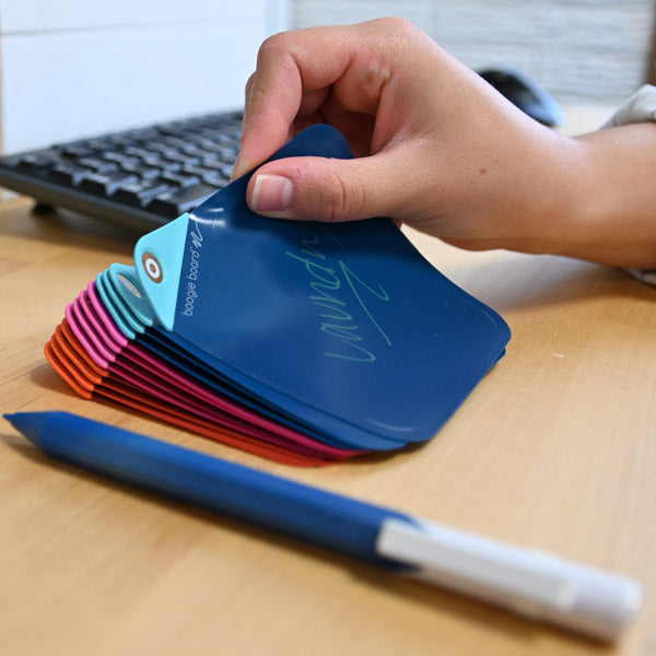 Stack of VersaNotes on a desk