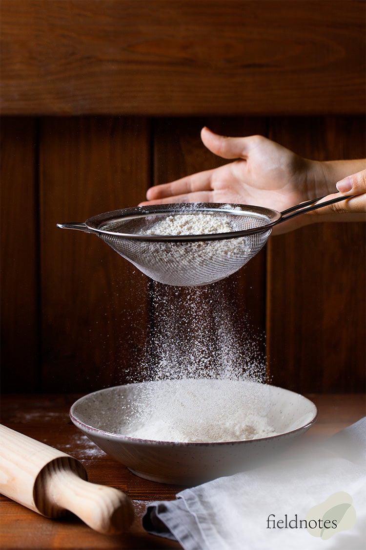 Chef Sifting Flour For Homemade Baking