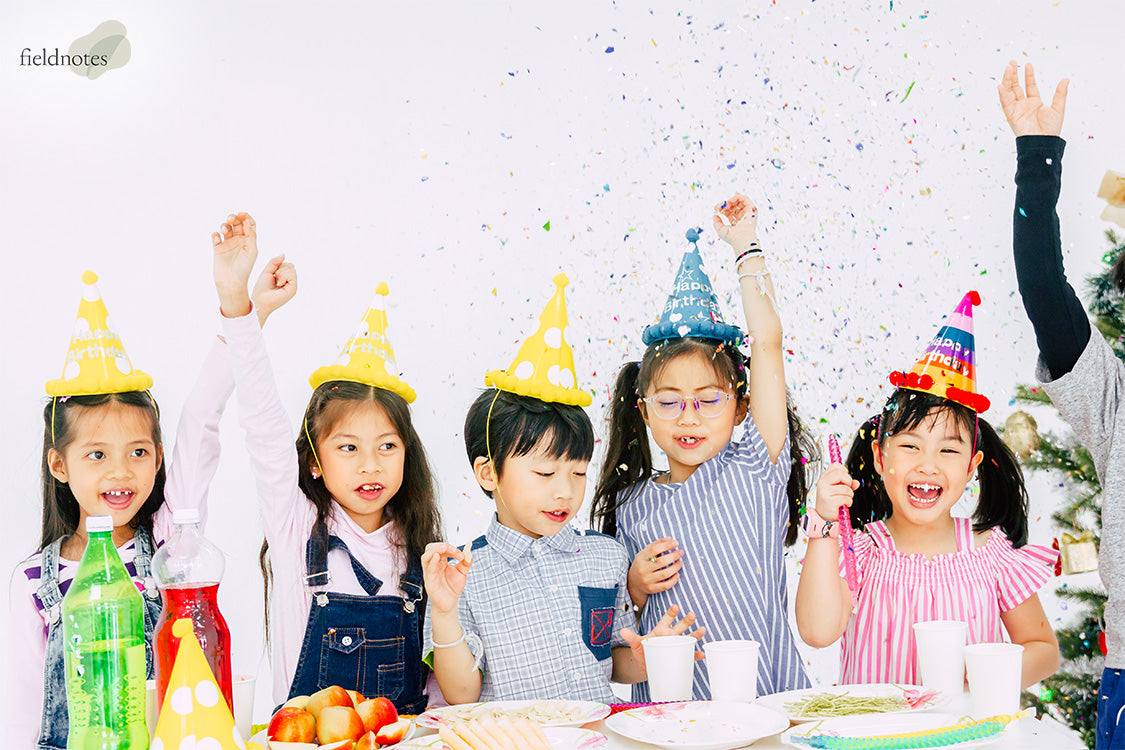 Depicting a Group of Children Enjoying Cake