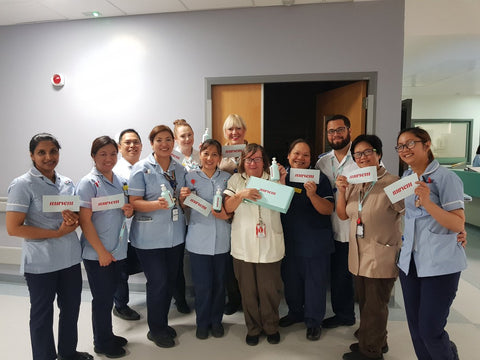 Nurses smiling with Nursem products