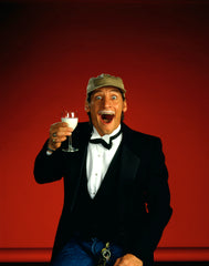 Jim Varney, comedian, holding glass of milk for advertising campaign, "Got Milk?"