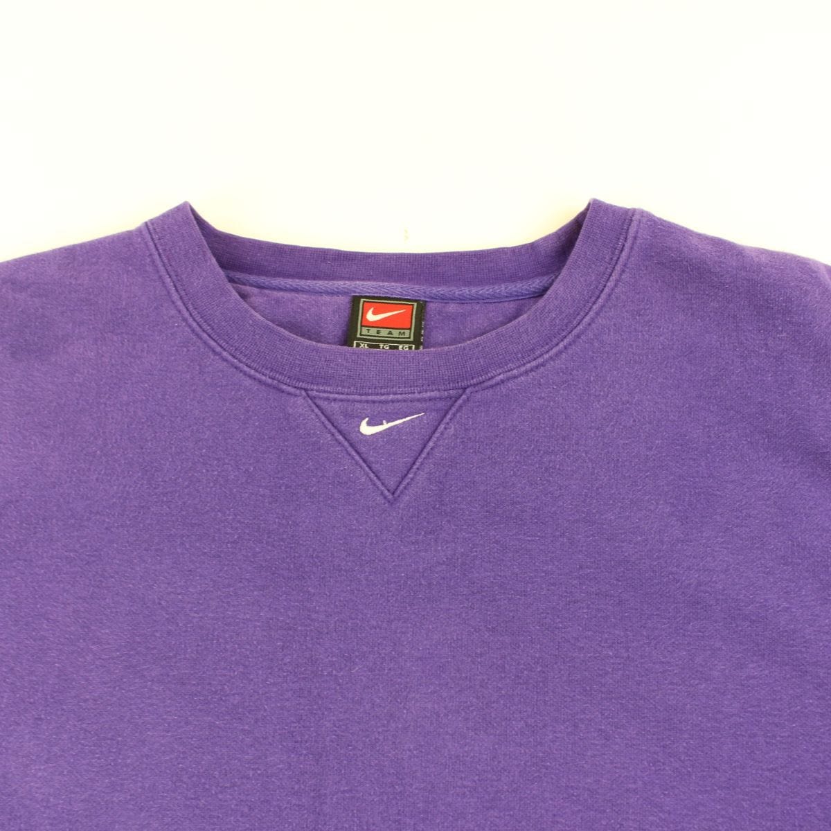 purple nike sign