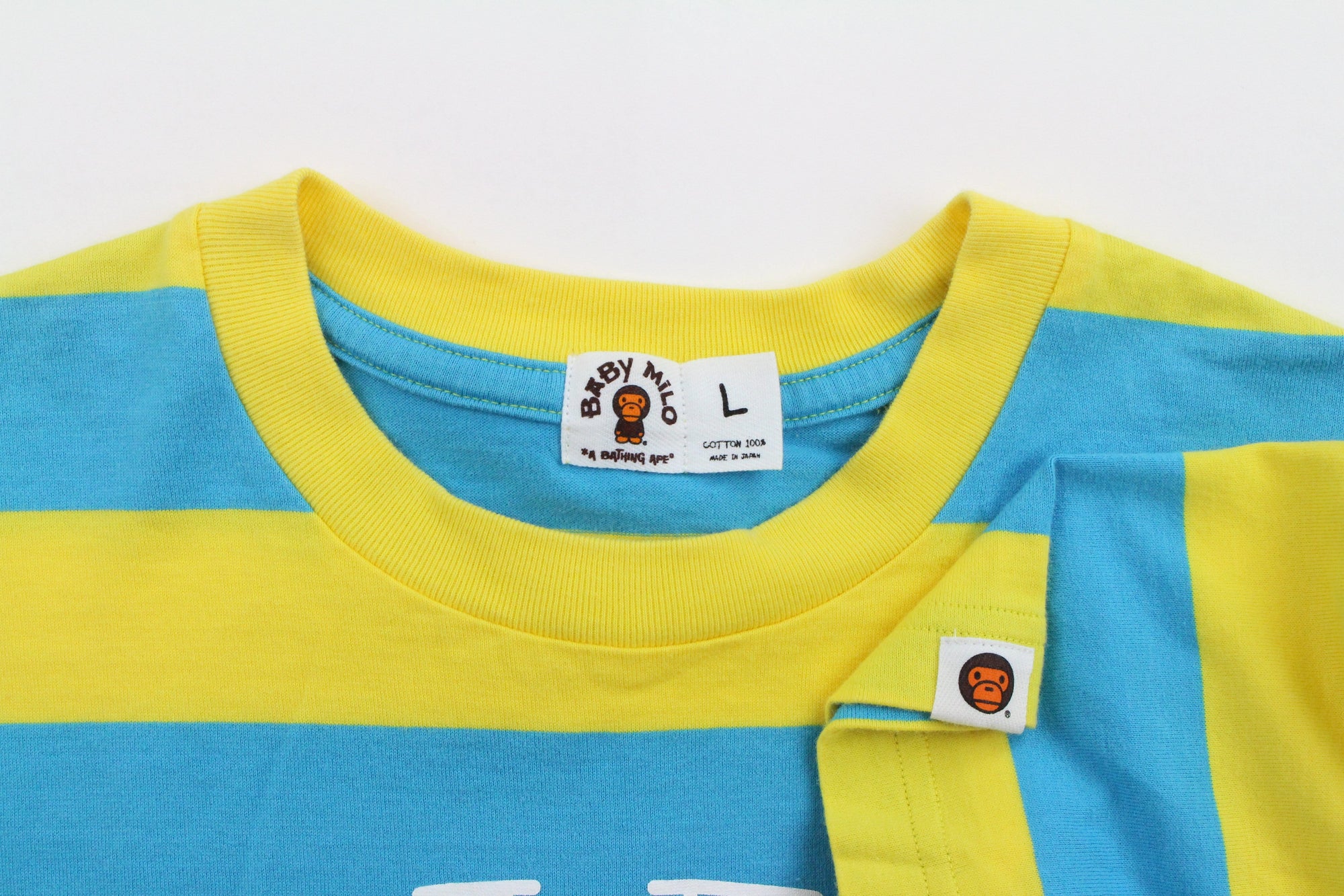 blue and yellow bape shirt