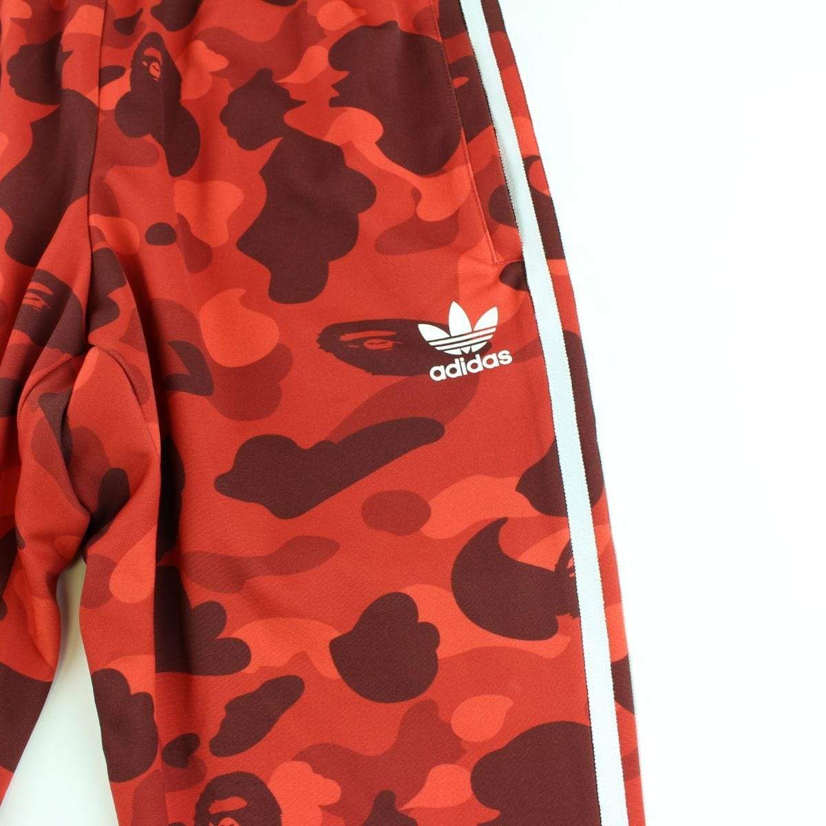 red camo adidas pants