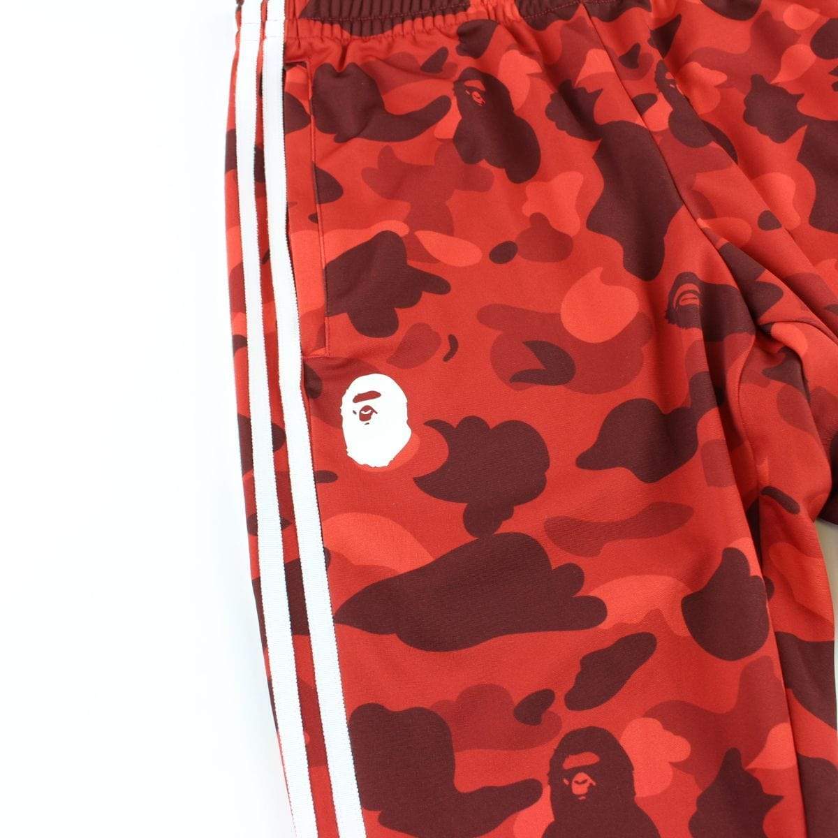 red camo adidas pants