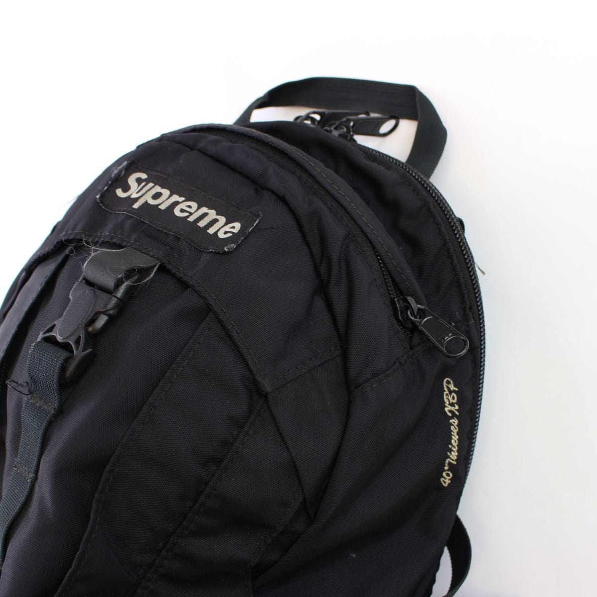 supreme black and white backpack