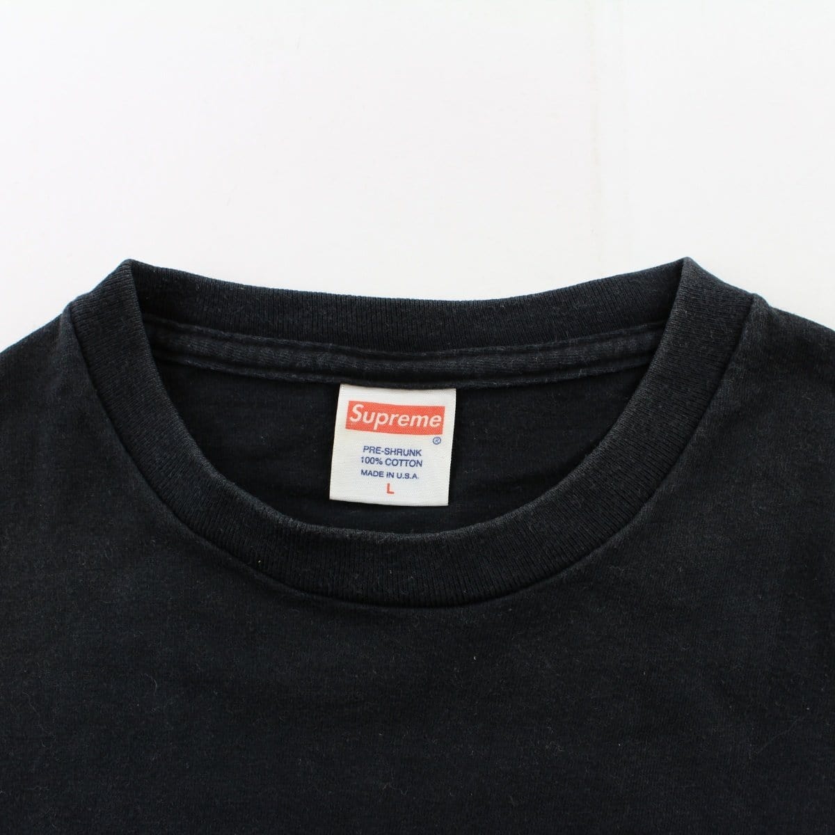 black supreme shirt real