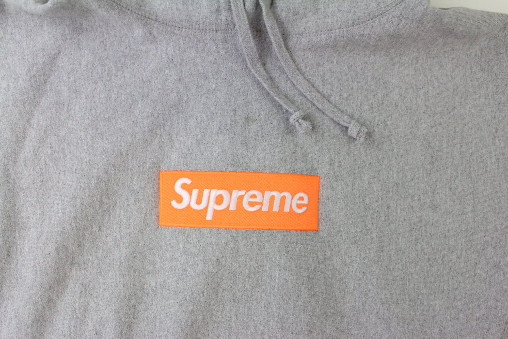 supreme grey and orange box logo