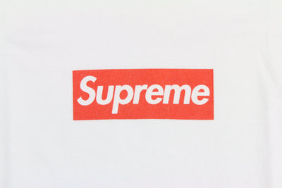 white supreme shirt with red logo