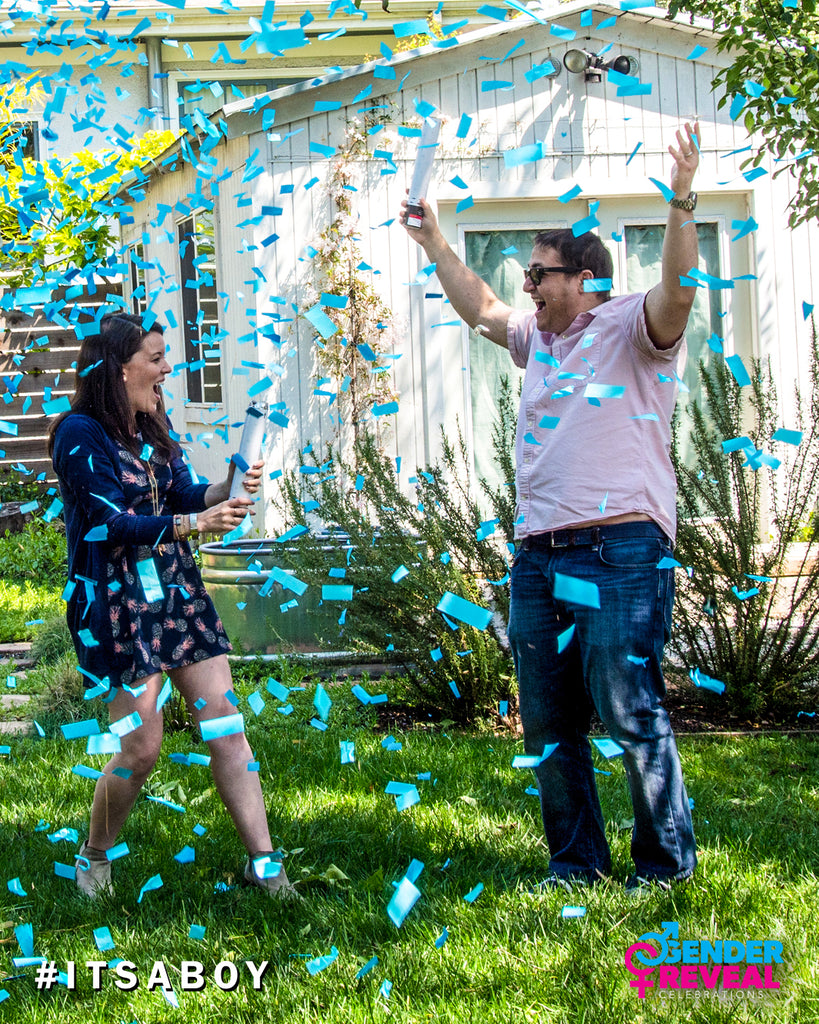 gender reveal balloon with confetti and powder