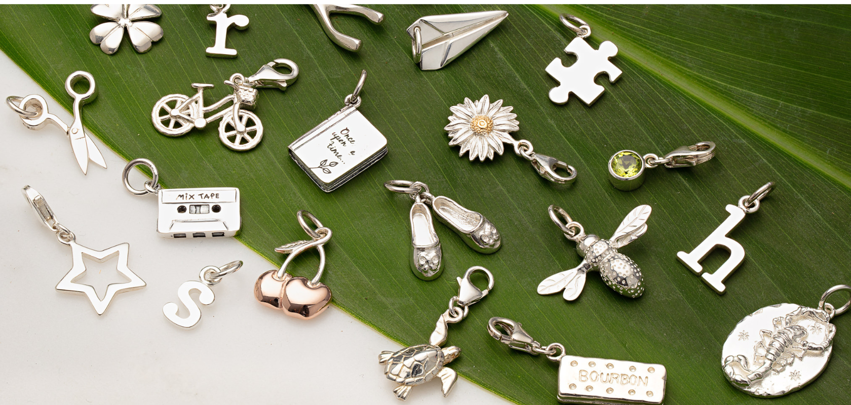 A selection of silver charms | Lily Charmed