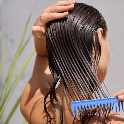 Girl brushing hair