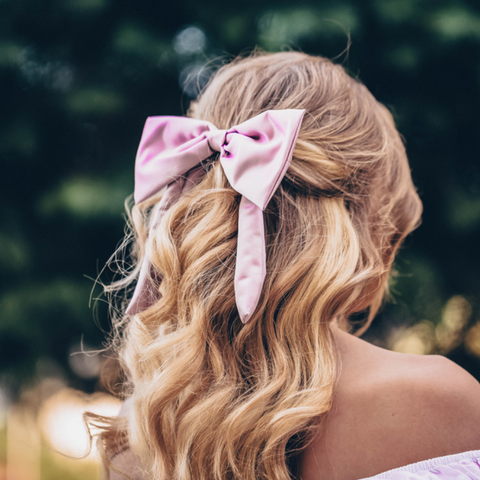 Girl with hair bow