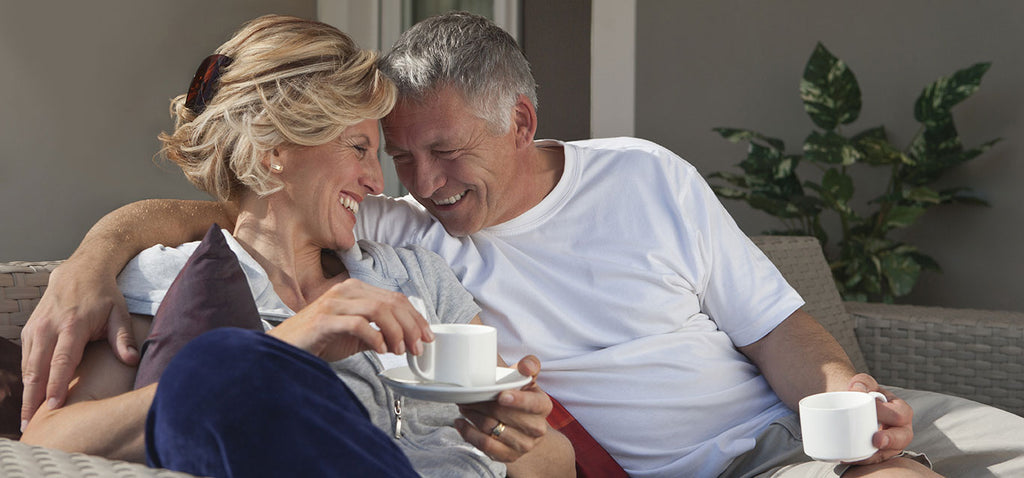 happy older couple having coffee
