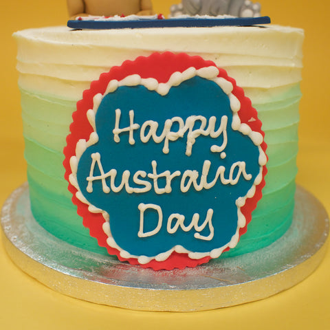 Australia Day theme home baked cake with colours of Australian Flag and  decorated with koalas and kangaroos Stock Photo - Alamy