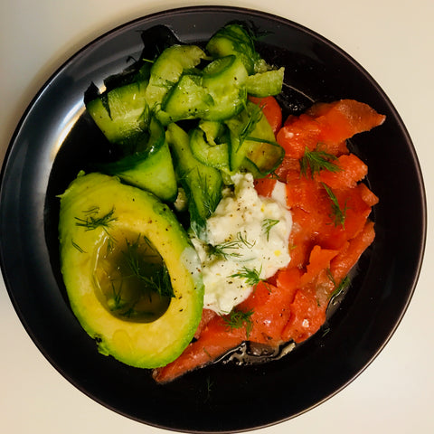 Salad with salmon, cottage cheese, avocado, dil, and cucumber