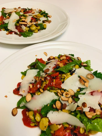 Two plates of fava bean salad