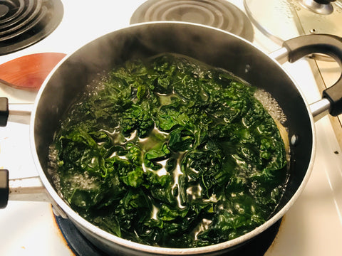 Wilting kale in boiling water
