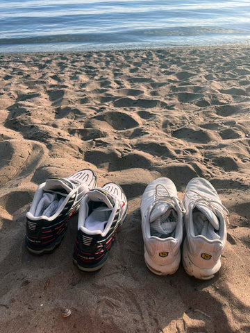sneaker on the beach sportswear nike tuned tn air max three black white leather fabric beach sand sun beach sea lake lake