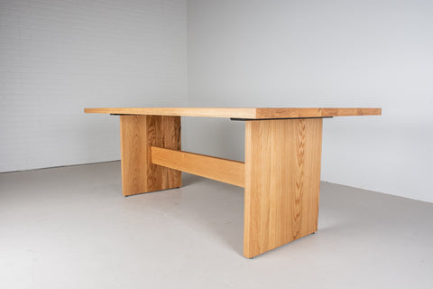 An Oak Trestle Table with Panel Legs