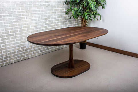 walnut dining table with blackened finish