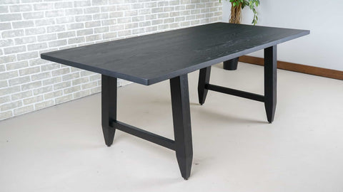 black finish on an oak dining table