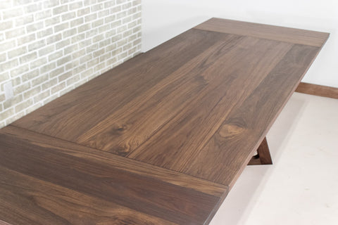 walnut extendable table with blackened finish