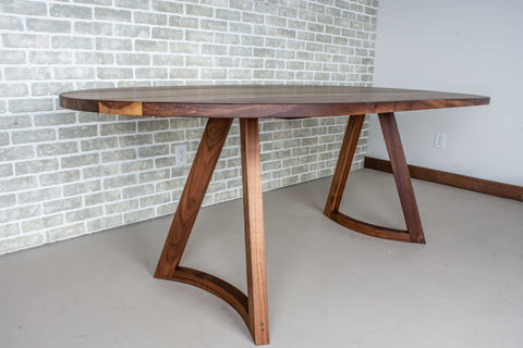 chesbro leg in walnut under a walnut table