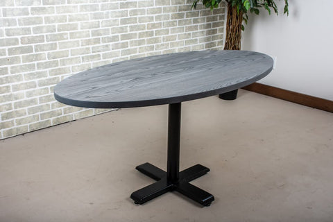 black bidwell base under an oval dining table