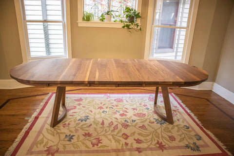 chesbro leg in walnut under a walnut table