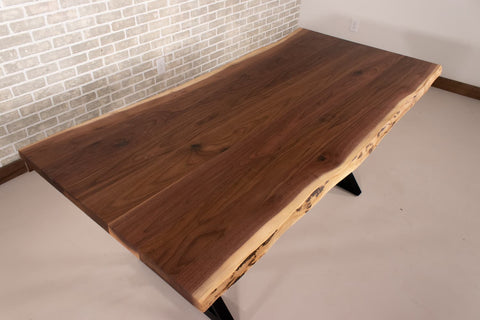 An image of a live edge walnut table.