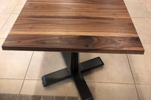 bidwell base under a square walnut table