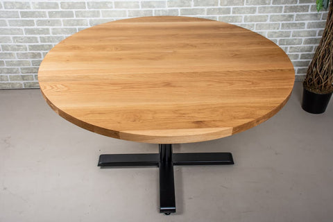 an oak table with a natural finish