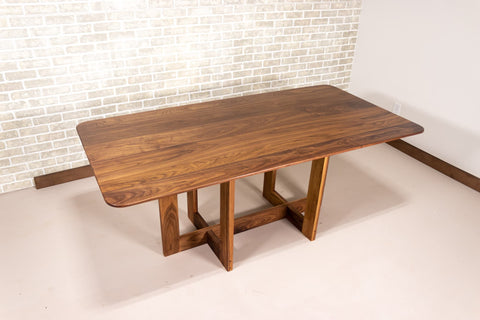 canonto base in walnut on walnut dining table