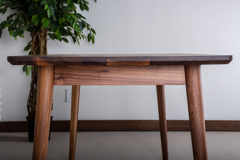 The Edge of a Dining Table with a Fraser Edge.