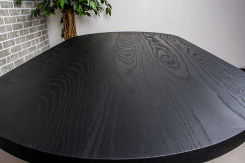 racetrack oval ash table with a black finish