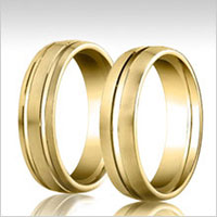 10K yellow gold grooved wedding bands