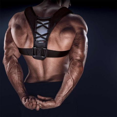 Male athlete wearing a posture corrector