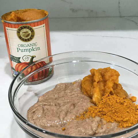 Organic pumpkin can and a bowl with turmeric and all the ingredients.