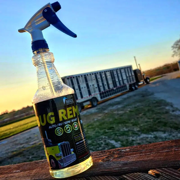 Bug Remover in front of semi truck and trailer during a beautiful sunset