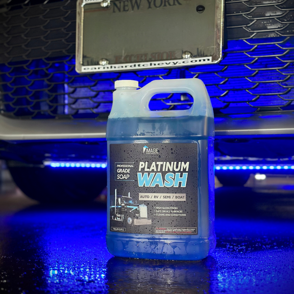 Platinum Wash in front of clean vehicle